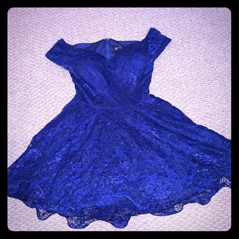 A dark blue off the shoulders formal dress
